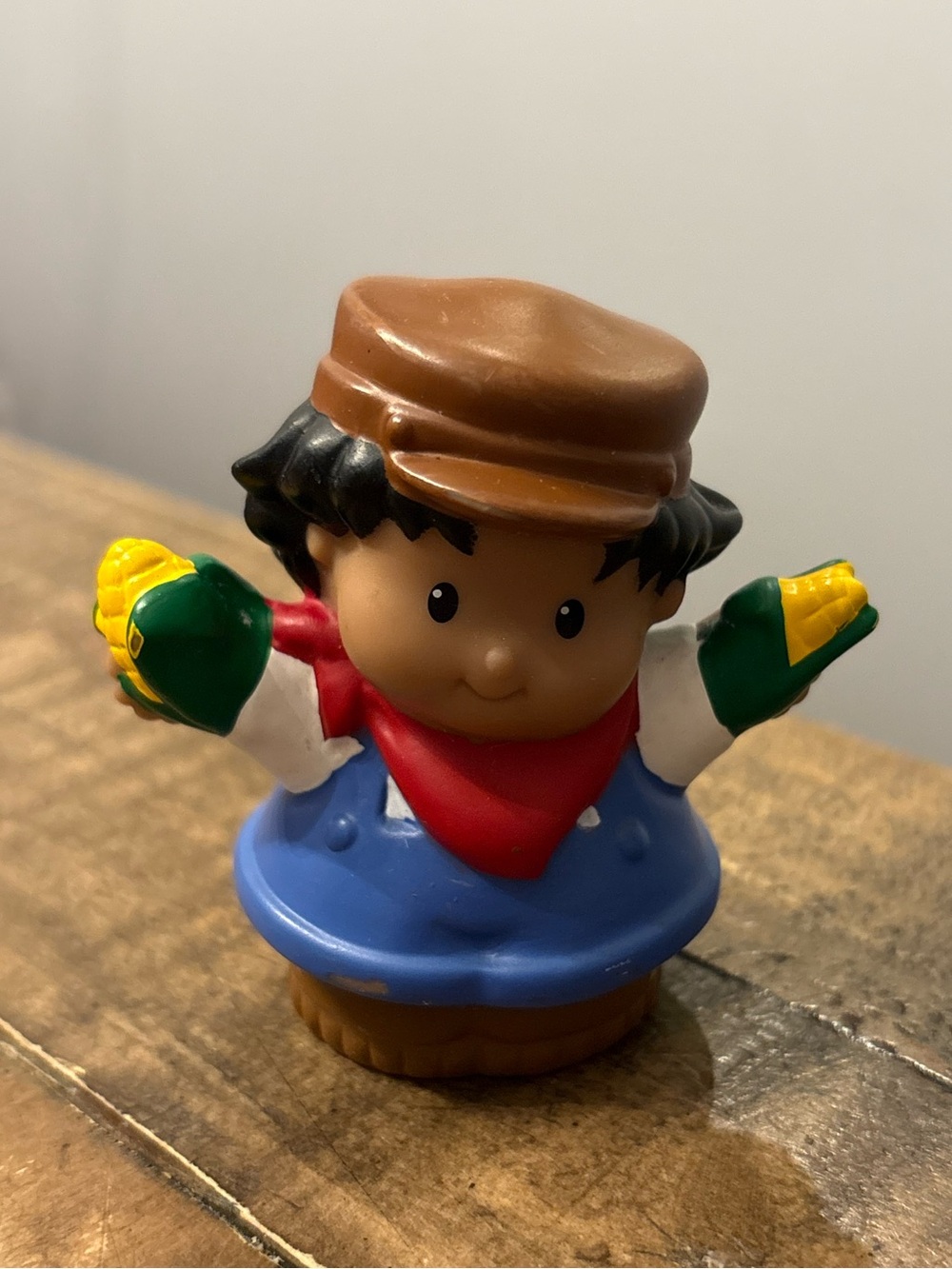 Little People Farmer Roberto Holding Corn